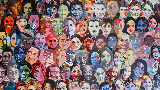 A mosaic of faces from the global autistic community, emphasizin